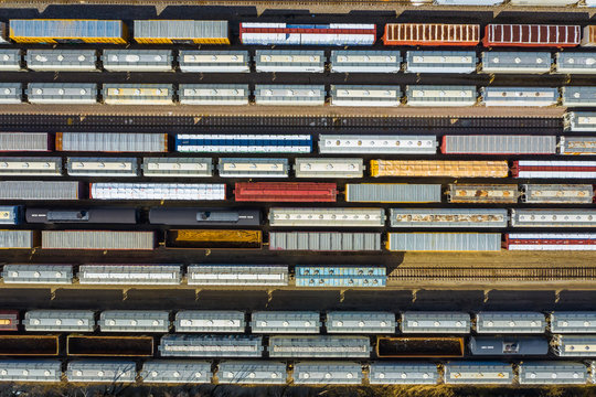 Aerial view of rail cars waiting at a staging railyard station in Aurora, IL - USA