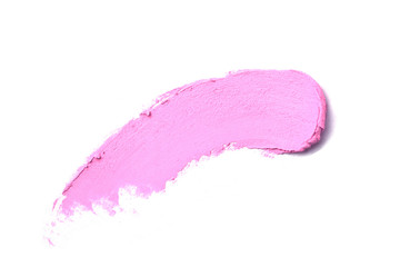 Pink Lipstick smudge isolated on white. Top view, flat lay.