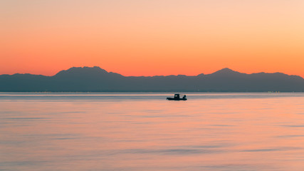 sea landscape, dawn on the sea off the coast of Turkey, in the background boat