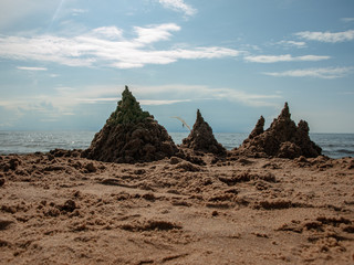 Sandcastle on the sea in summertime, Tuja, The Gulf of Riga. Baltic Sea