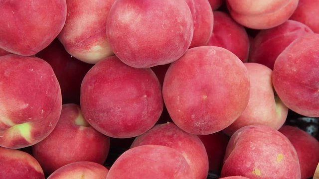 Fresh ripe peaches on farmer's market