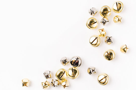 Gold and silver Jingle bells Christmas background. Flat lay,  top view