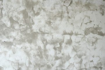 The surface of natural sand-cement plaster gray