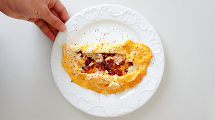 omelette with smoked beef sausage and cheese 