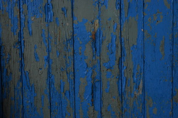 Background of three wooden boards with knots. Brushed boards with nails and knots of natural color. Textured wooden wall.