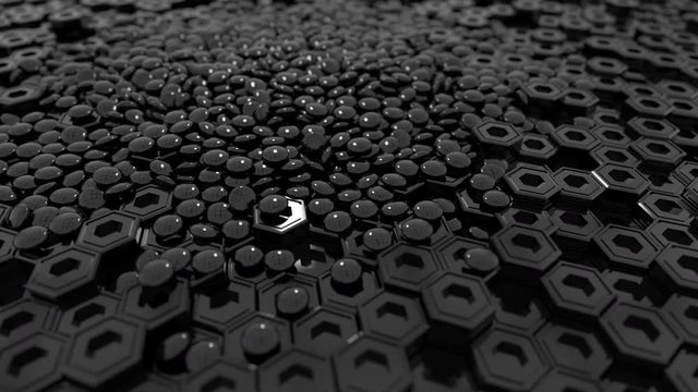 Geometric shapes abstract background. Hexagonal pillars and oblate spheres move in a chaotic flow. Wide-angle camera and panning shooting video. Black theme.