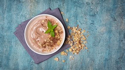 Healthy breakfast - oatmeal with chocolate homemade yogurt