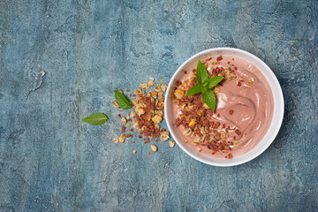 Healthy breakfast - oatmeal with chocolate homemade yogurt