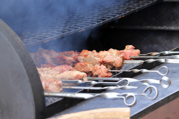 cooking on fire on a city street