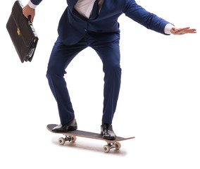 Businessman riding skateboard isolated on white background