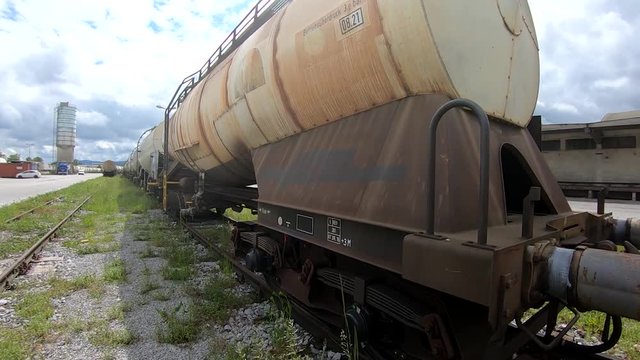 Wagon for liquids waits for further transportation on train depot