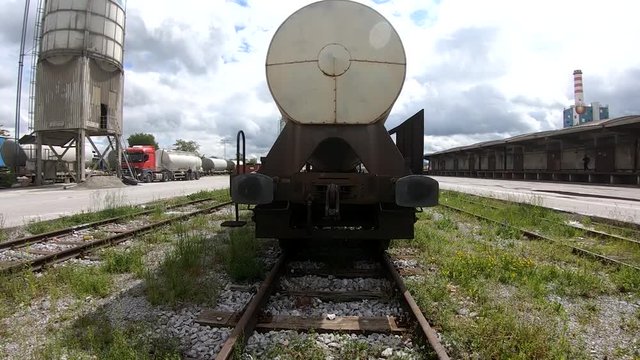 Wagon for liquids waits for further transportation on train depot