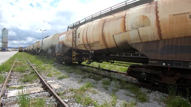Wagon for liquids waits for further transportation on train depot