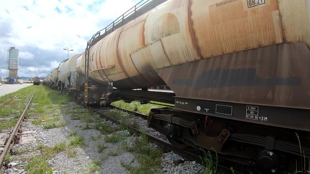 Wagon for liquids waits for further transportation on train depot