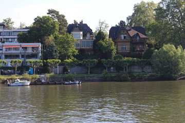 Fototapeta na wymiar Houses on water on Rhine river in Wiesbaden