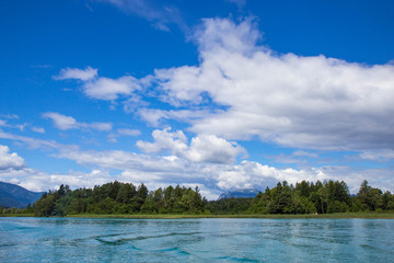 Obraz premium sky over Faaker see in Ausrian Alps, Carinthia region