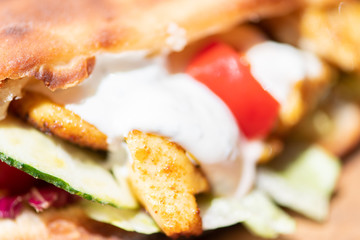 Closeup of healthy grilled chicken sandwich with homemade baguette.