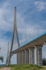 Fototapeta premium Normandy bridge, France - 06 01 2019: View of the pylons and cables of the Bridge