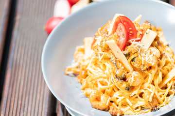 Pasta, spaghetti with cheese, mushrooms and tomato. Healthy food.