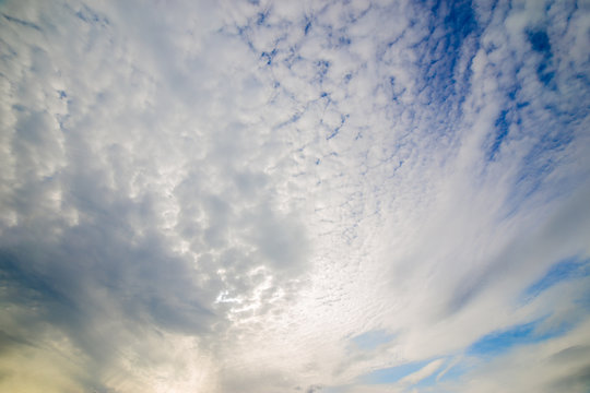 Cirrus clouds in the blue sky .background