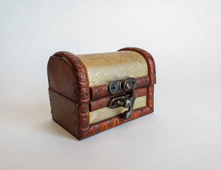 Wooden golden old fashion small chest box, treasure box on the white natural background, not isolated.
