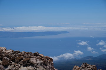 Fototapeta na wymiar Sea views from mountain top volcanic landscape