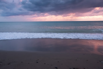 sea sunset on the sandy shore