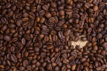 Coffee grains fall in closeup. Food and Drink