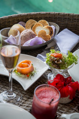 Floating breakfast, a large sturdy tray in the pool,  complete morning meal, with hot beverages, warm bread and condiments