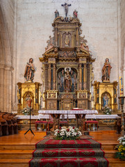 Fototapeta na wymiar Altar of the collegiate church of Santa Maria la Real in the village of Sasamon, Spain.