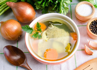 Fish soup served on the table in plate
