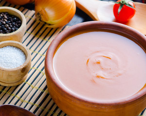 Pumpkin soup served on the table in bowl