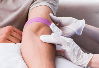 Patient getting blood transfusion in hospital clinic