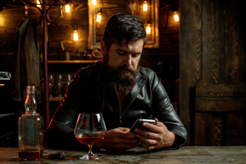 Portrait of a handsome man with beard. Brutality and masculine concept. Man with beard, biker in...