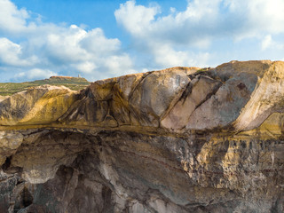 Aerial landscape of Gozo island. Wied il-Mielah. Natural arch, lighthouse. Malta 