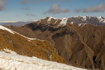 wonderful dramatic scenery of the Southern alps and Lake Wanaka from the top of Roy's Peak in New Zealand   