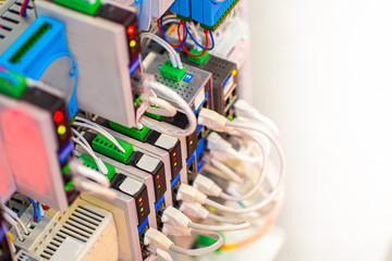 Cables are connected to modem. Electronic and Electrical Concept. Server equipment. Equipment for...