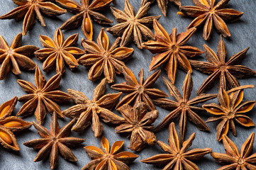 Brown star Anise scattered on the table