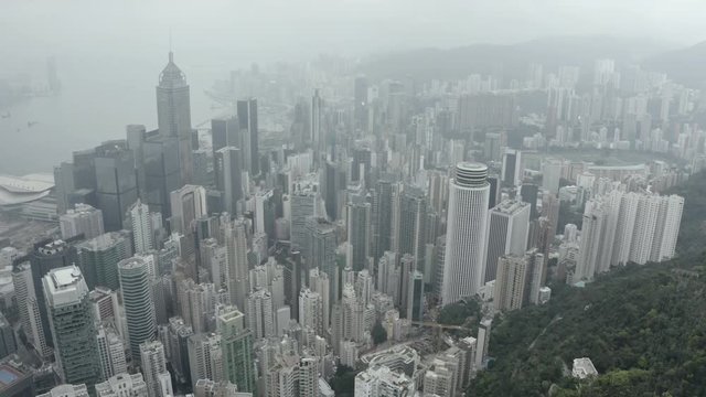 Aerial view of Hong Kong city skyline in foggy weather