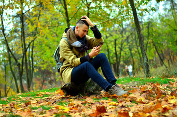 young man in autumn park