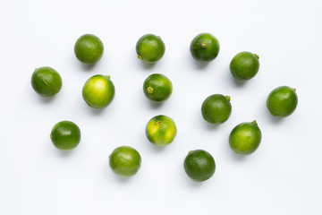 Fresh limes isolated on white