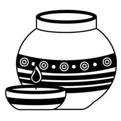 indian ceramic pot with candle flame