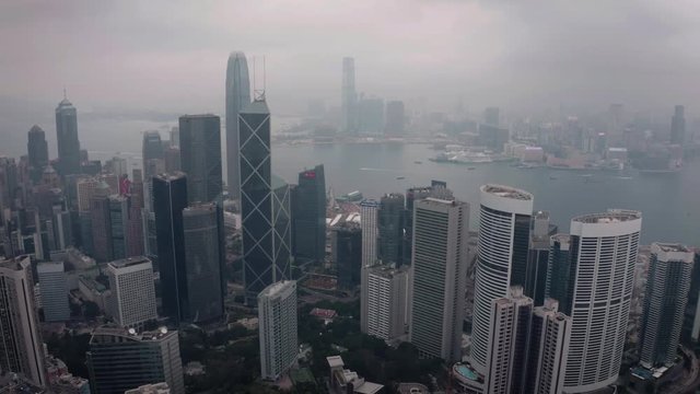 Aerial view of Hong Kong city skyline with clouds