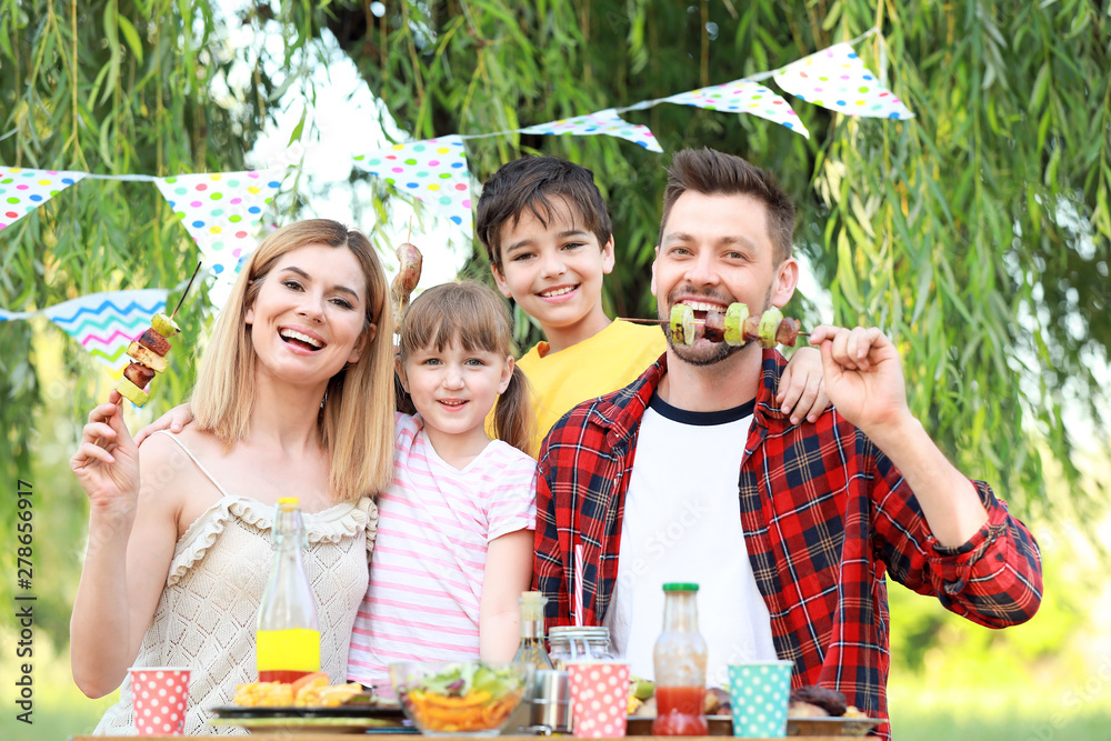 Poster happy family having picnic on summer day