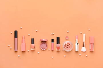 Set of decorative cosmetics on color background