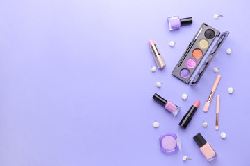 Set of decorative cosmetics on color background