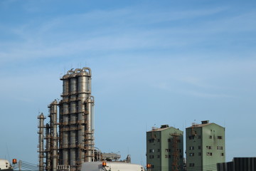 oil refinery at sunset