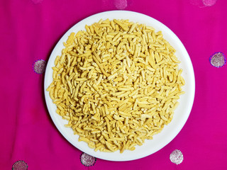 Indorei long sev in white plate on dark background.