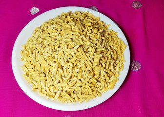 Indorei long sev in white plate on dark background.