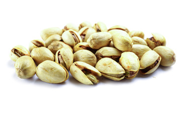 Pistachio nuts on white background : healthy food concept.